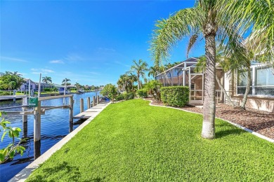 ESCAPE TO YOUR WATERFRONT POOL HOME IN PUNTA GORDA ISLES! This on Saint Andrews South Golf Club in Florida - for sale on GolfHomes.com, golf home, golf lot