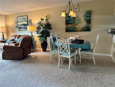 Step into a tastefully, fully furnished 2nd-floor condominium in on Sun n Lake Golf and Country Club in Florida - for sale on GolfHomes.com, golf home, golf lot