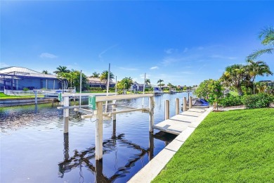 ESCAPE TO YOUR WATERFRONT POOL HOME IN PUNTA GORDA ISLES! This on Saint Andrews South Golf Club in Florida - for sale on GolfHomes.com, golf home, golf lot