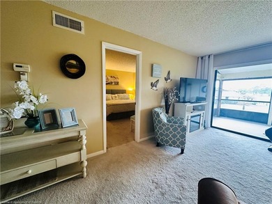 Step into a tastefully, fully furnished 2nd-floor condominium in on Sun n Lake Golf and Country Club in Florida - for sale on GolfHomes.com, golf home, golf lot