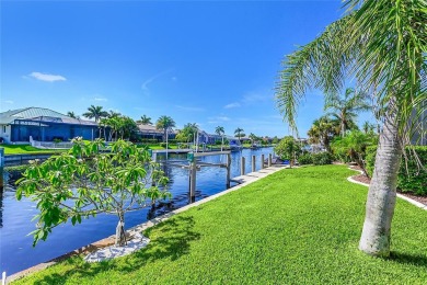 ESCAPE TO YOUR WATERFRONT POOL HOME IN PUNTA GORDA ISLES! This on Saint Andrews South Golf Club in Florida - for sale on GolfHomes.com, golf home, golf lot