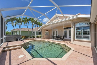 ESCAPE TO YOUR WATERFRONT POOL HOME IN PUNTA GORDA ISLES! This on Saint Andrews South Golf Club in Florida - for sale on GolfHomes.com, golf home, golf lot
