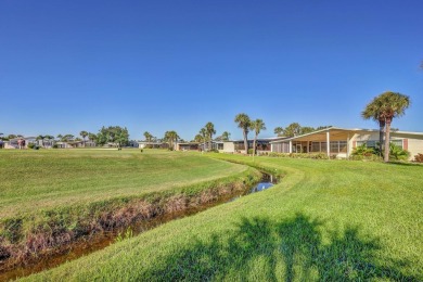 FANTASTIC PRICE REDUCTION for golf course views overlooking the on Maple Leaf Golf and Country Club in Florida - for sale on GolfHomes.com, golf home, golf lot