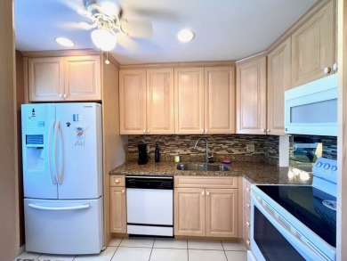 Immaculate, airy, bright turnkey condo (includes all furniture on Fountains Golf and Country Club in Florida - for sale on GolfHomes.com, golf home, golf lot