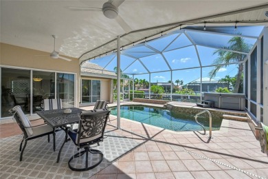 PRICED TO SELL!! THIS WATERFRONT, POOL HOME IN PUNTA GORDA ISLES on Saint Andrews South Golf Club in Florida - for sale on GolfHomes.com, golf home, golf lot
