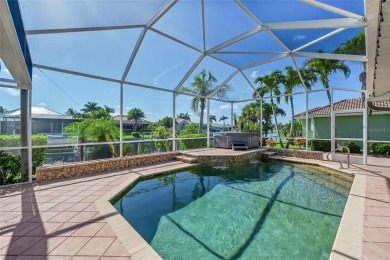 PRICED TO SELL!! THIS WATERFRONT, POOL HOME IN PUNTA GORDA ISLES on Saint Andrews South Golf Club in Florida - for sale on GolfHomes.com, golf home, golf lot