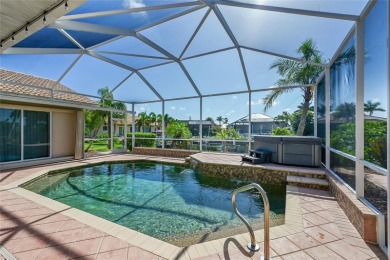 PRICED TO SELL!! THIS WATERFRONT, POOL HOME IN PUNTA GORDA ISLES on Saint Andrews South Golf Club in Florida - for sale on GolfHomes.com, golf home, golf lot