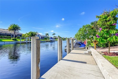 PRICED TO SELL!! THIS WATERFRONT, POOL HOME IN PUNTA GORDA ISLES on Saint Andrews South Golf Club in Florida - for sale on GolfHomes.com, golf home, golf lot