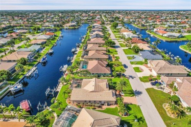 PRICED TO SELL!! THIS WATERFRONT, POOL HOME IN PUNTA GORDA ISLES on Saint Andrews South Golf Club in Florida - for sale on GolfHomes.com, golf home, golf lot