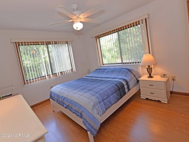 This beautiful three bedroom condo on the golf course at Caswell on Oak Island Golf Club in North Carolina - for sale on GolfHomes.com, golf home, golf lot