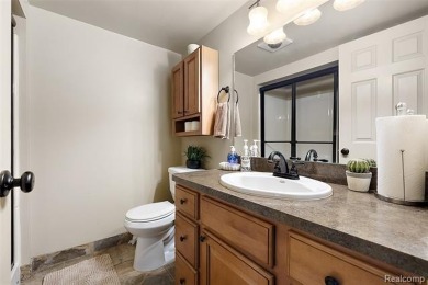 Discover this beautifully updated first floor ranch condo on Maple Lane Golf Club in Michigan - for sale on GolfHomes.com, golf home, golf lot