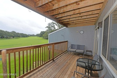 This beautiful three bedroom condo on the golf course at Caswell on Oak Island Golf Club in North Carolina - for sale on GolfHomes.com, golf home, golf lot