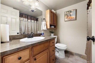 Discover this beautifully updated first floor ranch condo on Maple Lane Golf Club in Michigan - for sale on GolfHomes.com, golf home, golf lot