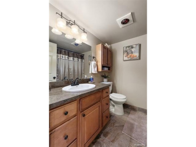 Discover this beautifully updated first floor ranch condo on Maple Lane Golf Club in Michigan - for sale on GolfHomes.com, golf home, golf lot