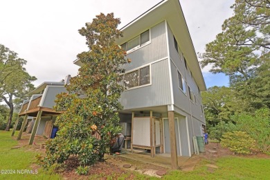 This beautiful three bedroom condo on the golf course at Caswell on Oak Island Golf Club in North Carolina - for sale on GolfHomes.com, golf home, golf lot