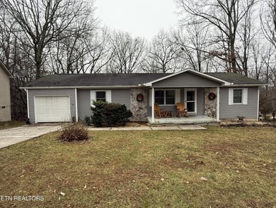 Nestled in the heart of Fairfield Glade, this charming home at on Druid Hills Golf Club in Tennessee - for sale on GolfHomes.com, golf home, golf lot