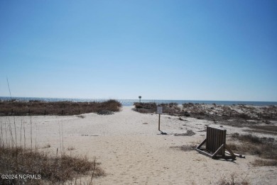 This beautiful three bedroom condo on the golf course at Caswell on Oak Island Golf Club in North Carolina - for sale on GolfHomes.com, golf home, golf lot