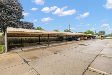 Discover this beautifully updated first floor ranch condo on Maple Lane Golf Club in Michigan - for sale on GolfHomes.com, golf home, golf lot
