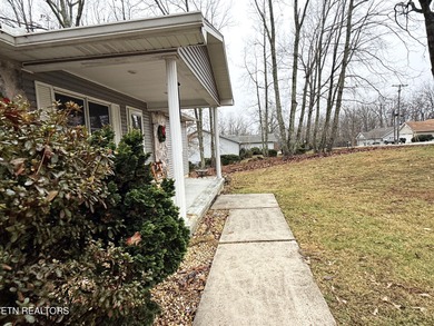 Nestled in the heart of Fairfield Glade, this charming home at on Druid Hills Golf Club in Tennessee - for sale on GolfHomes.com, golf home, golf lot
