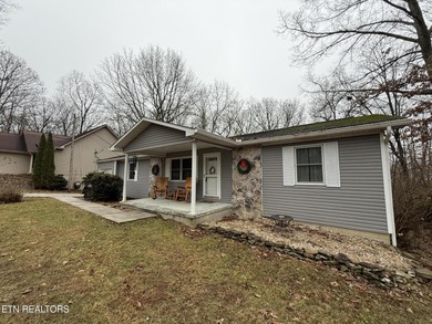 Nestled in the heart of Fairfield Glade, this charming home at on Druid Hills Golf Club in Tennessee - for sale on GolfHomes.com, golf home, golf lot