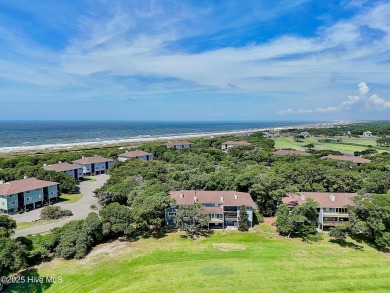 This attractive three-bedroom condominium, located on the golf on Oak Island Golf Club in North Carolina - for sale on GolfHomes.com, golf home, golf lot
