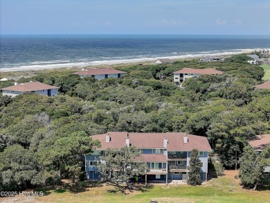 This attractive three-bedroom condominium, located on the golf on Oak Island Golf Club in North Carolina - for sale on GolfHomes.com, golf home, golf lot