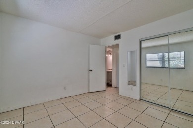 An affordable 2 bedroom, 2 bath condo unit on the 1st floor in a on Daytona Beach Golf Club in Florida - for sale on GolfHomes.com, golf home, golf lot