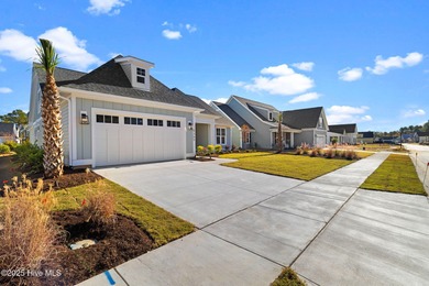 The Sanderling IV by Bell Custom Homes offers a spacious on Cape Fear National At Brunswick Forest in North Carolina - for sale on GolfHomes.com, golf home, golf lot