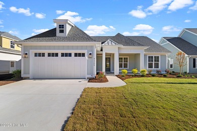 The Sanderling IV by Bell Custom Homes offers a spacious on Cape Fear National At Brunswick Forest in North Carolina - for sale on GolfHomes.com, golf home, golf lot