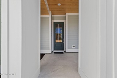 The Sanderling IV by Bell Custom Homes offers a spacious on Cape Fear National At Brunswick Forest in North Carolina - for sale on GolfHomes.com, golf home, golf lot