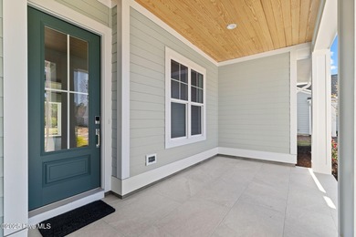 The Sanderling IV by Bell Custom Homes offers a spacious on Cape Fear National At Brunswick Forest in North Carolina - for sale on GolfHomes.com, golf home, golf lot