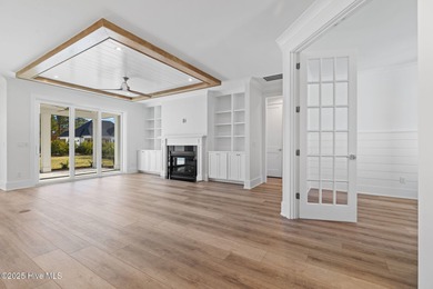 The Sanderling IV by Bell Custom Homes offers a spacious on Cape Fear National At Brunswick Forest in North Carolina - for sale on GolfHomes.com, golf home, golf lot