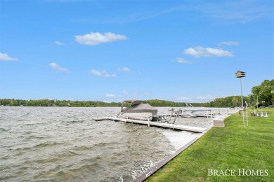 Don't miss this incredible opportunity to own the lakehouse of on Holland Lake Golf Course Inc. in Michigan - for sale on GolfHomes.com, golf home, golf lot