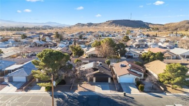 Situated a block east of Cerbat Hills Golf Course, this properly on Cerbat Cliffs Golf Course in Arizona - for sale on GolfHomes.com, golf home, golf lot