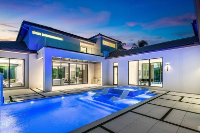 An architectural gem newly constructed in 2024, this on St. Andrews Country Club of Boca Raton in Florida - for sale on GolfHomes.com, golf home, golf lot