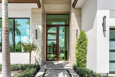 An architectural gem newly constructed in 2024, this on St. Andrews Country Club of Boca Raton in Florida - for sale on GolfHomes.com, golf home, golf lot
