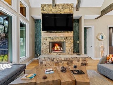 This light-filled mountain home blends modern design with the on Burlingame Country Club in North Carolina - for sale on GolfHomes.com, golf home, golf lot