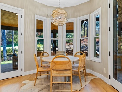 This light-filled mountain home blends modern design with the on Burlingame Country Club in North Carolina - for sale on GolfHomes.com, golf home, golf lot