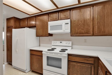 Enjoy the cooling breezes and fabulous views from this spacious on Leisure Village Par 3 Golf Course in California - for sale on GolfHomes.com, golf home, golf lot