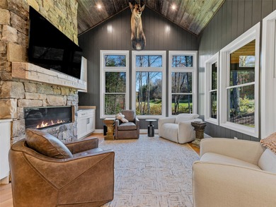This light-filled mountain home blends modern design with the on Burlingame Country Club in North Carolina - for sale on GolfHomes.com, golf home, golf lot
