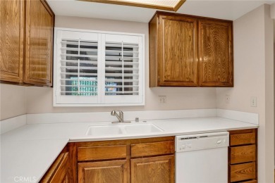 Enjoy the cooling breezes and fabulous views from this spacious on Leisure Village Par 3 Golf Course in California - for sale on GolfHomes.com, golf home, golf lot
