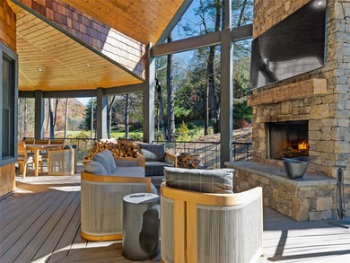 This light-filled mountain home blends modern design with the on Burlingame Country Club in North Carolina - for sale on GolfHomes.com, golf home, golf lot