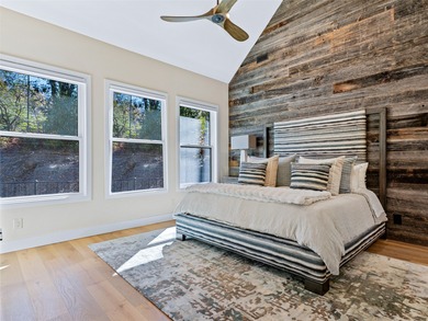 This light-filled mountain home blends modern design with the on Burlingame Country Club in North Carolina - for sale on GolfHomes.com, golf home, golf lot