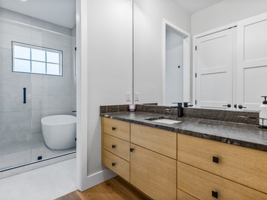 This light-filled mountain home blends modern design with the on Burlingame Country Club in North Carolina - for sale on GolfHomes.com, golf home, golf lot