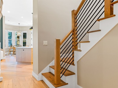 This light-filled mountain home blends modern design with the on Burlingame Country Club in North Carolina - for sale on GolfHomes.com, golf home, golf lot