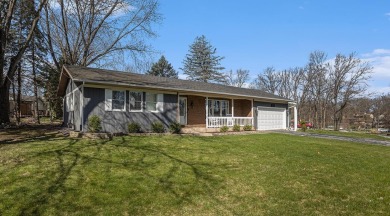 Welcome home to this beautifully remodeled 4-bedroom, 3-bath on Lakes of the Four Seasons Country Club in Indiana - for sale on GolfHomes.com, golf home, golf lot