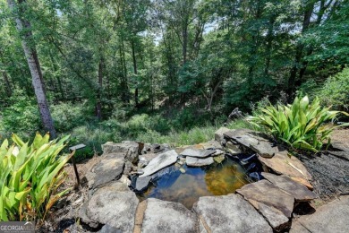 Picture-perfect 6 bed/5 bath CUL-DE-SAC home with GUEST BEDROOM on Laurel Springs Golf Club in Georgia - for sale on GolfHomes.com, golf home, golf lot