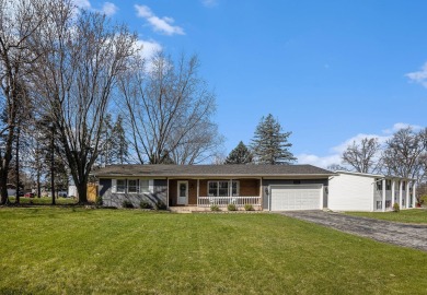 Welcome home to this beautifully remodeled 4-bedroom, 3-bath on Lakes of the Four Seasons Country Club in Indiana - for sale on GolfHomes.com, golf home, golf lot