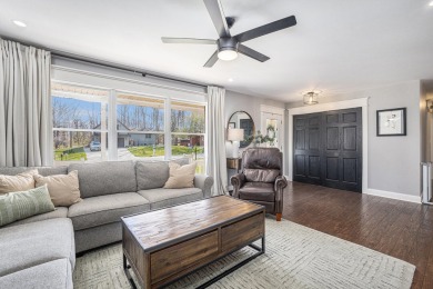Welcome home to this beautifully remodeled 4-bedroom, 3-bath on Lakes of the Four Seasons Country Club in Indiana - for sale on GolfHomes.com, golf home, golf lot