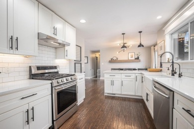 Welcome home to this beautifully remodeled 4-bedroom, 3-bath on Lakes of the Four Seasons Country Club in Indiana - for sale on GolfHomes.com, golf home, golf lot